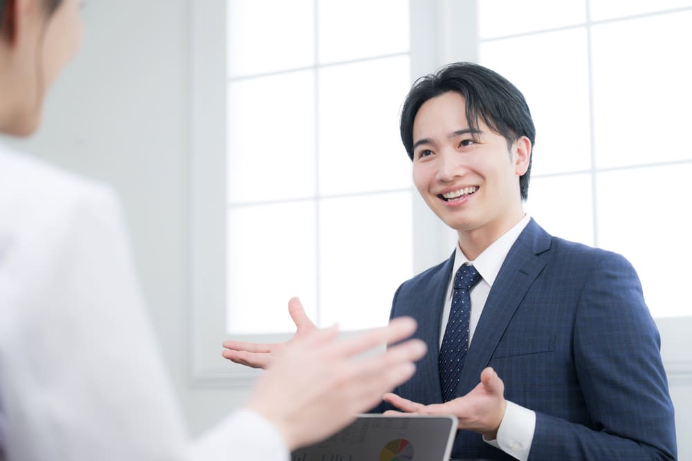 Witの正社員が保護者に説明している様子